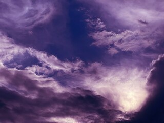 Fototapeta na wymiar Dramatic sky stormy purple clouds at night