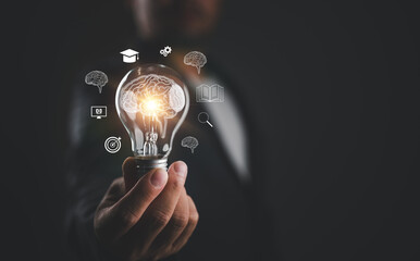 E-learning graduate certificate program concept. Man holding lightbulb showing education icon, Internet education course degree, study knowledge to creative thinking idea and problem-solving solution