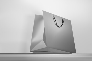 Gray paper matt shopping bag mockup with black handles
