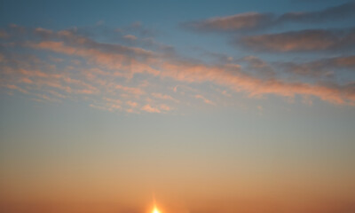 Beautiful sky background - Sunset Sunrise sky with light clouds and real sun.