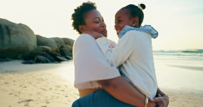 Sunset, dancing and mother with child on beach for summer vacation, weekend trip or holiday. Happy, smile and African mom moving and carrying girl kid by ocean or sea bonding, playing and having fun.