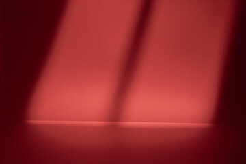 Studio Red background in abstract style. Christmas red abstract gradient background with light shafts and soft shadow