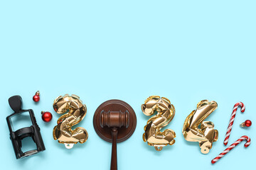 Composition with figure 2024 made of balloons, judge's gavel, stamp and Christmas decor on color background - obrazy, fototapety, plakaty