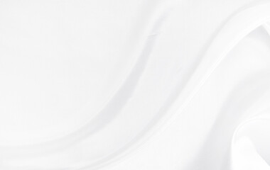 White gray satin texture that is white silver fabric silk background with beautiful soft blur pattern natural.