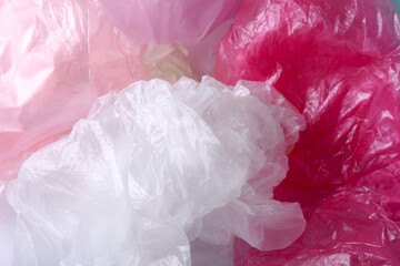 Many plastic bags as background, closeup view