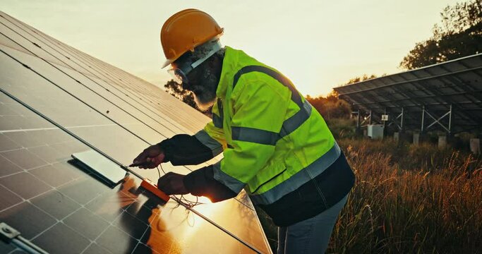 Senior engineer man, solar panel and tablet for typing, analysis and multimeter to check grid in field. Photovoltaic renewable energy, touchscreen and repair with app for sustainable electricity