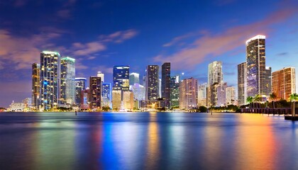 Miami city skyline with skyscrapers on the water - obrazy, fototapety, plakaty