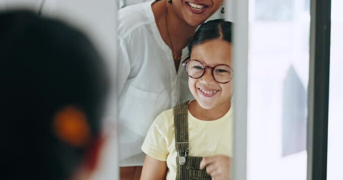 Mirror, child and choice for glasses, smile and eye care for healthcare, reflection and decision for eyewear. Happy girl, medicare and excited for frame, optometry and consulting or wellness vision