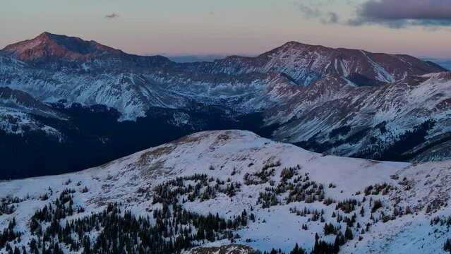 Mount Yale Colligate Peaks first snow golden hour aerial cinematic drone dramatic Rocky Mountains sunset pink orange red stunning freezing cold frozen Monarch Pass Salina Buena Vista Colorado circle