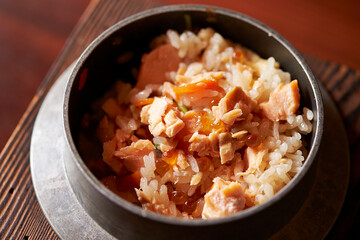 Stone pot rice with fish and vegetables