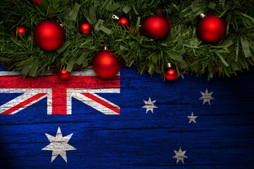 Christmas background made with garlands on a australia flag background. Christmas greeting from australia.