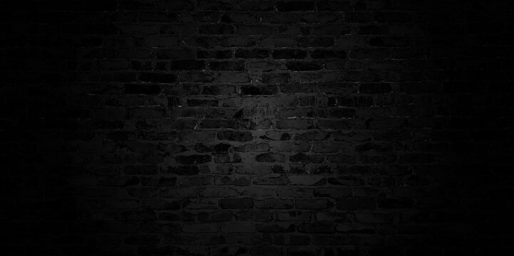 Yellow brick wall texture background. Brick wall. Old vintage brick wall pattern. Black brick wall horizontal background. horizontal part of black painted brick wall