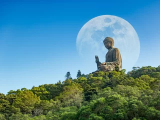 Tuinposter Tian Tan Buddha Statue Po Lin Monastery, Lantau Island, Ngong Ping Village in Hong Kong, scenery on heaven Big buddha in moon and blue sky, religion sacred landmark of tourists and buddhists tourism. © sompao