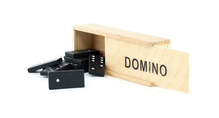 Wooden box with black domino tiles isolated on white