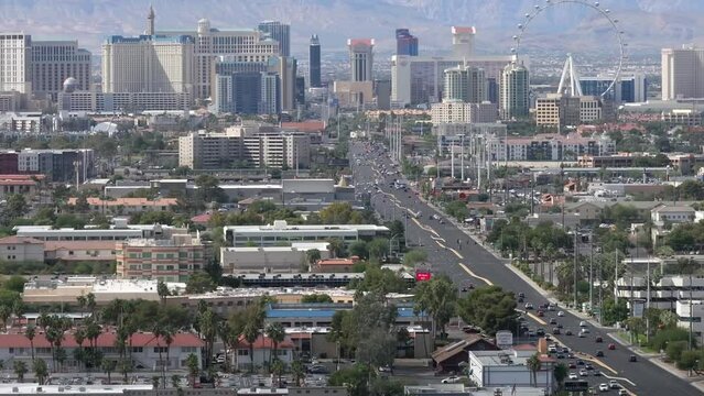 Las Vegas strip, Nevada tilt up zoomed in aerial reveal in daytime