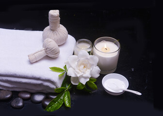 beautiful spa setting of spa ball, candle, towel, with gardenia, - 691790433