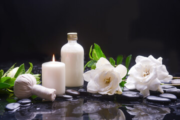 beautiful spa setting of spa ball, candle, with gardenia,
