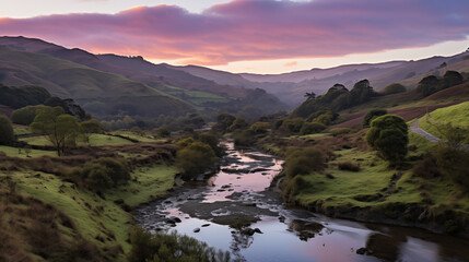 Sunrise over mountains with a serene lake reflecting sky's pink and orange hues. Ideal for travel, inspiration. No human elements, pure nature.