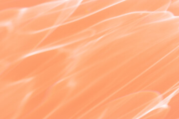 Wavy lines of light as Abstract background peach colored, natural flare from lights, trend color...