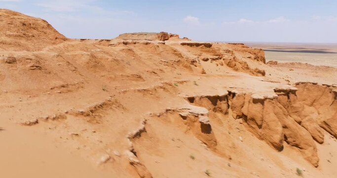 Sandstone Rocks - Flaming Cliffs (Bayanzag) In Mongolia - Aerial Drone Shot