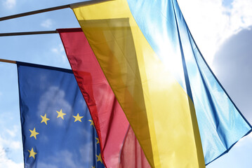 The flag of Poland, the flag of Ukraine and the flag of the European Union