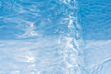  Bluewater bubbles on the surface ripples. Defocus blurred transparent white-black colored clear...
