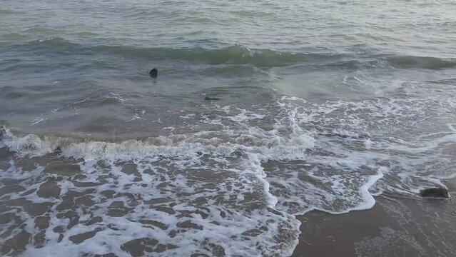 Beautiful View of the Nagoa beach waves, Diu India. 