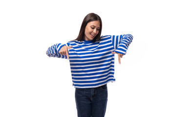 pretty slender brunette with straight hair is dressed in blue striped sailor clothes