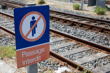 passage interdit french text sign road means pedestrian passage prohibited on the train rails
