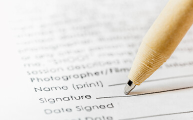  pen made of pure materials puts a signature on the document