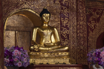 Buddha at wat pra singha Chiangmai Thailand.