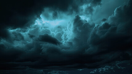 Obraz premium dark blue sky with clouds. Black dark greenish blue night sky. Gloomy ominous storm rain clouds background.