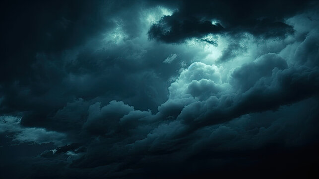 dark blue sky with clouds.  Black dark greenish blue  night sky. Gloomy ominous storm rain clouds background.
