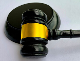 Close up of gavel on white background. Copy space and law concept