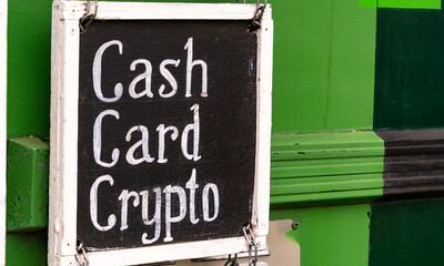 Cash, Card, Crypto payment sign outside a street trader