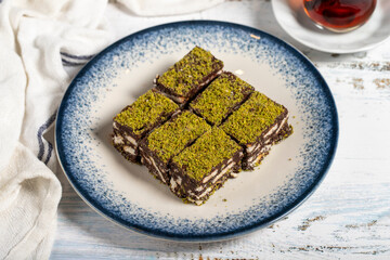 Pistachio and biscuit cookies on a white background. Delicious cocoa cookies