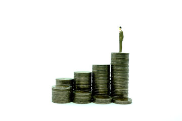 Increasing piles of coins.Coins graph-Business growth-finance plan-Business idea concept,Businessman with business success and financial
