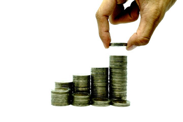 Business growth concept, Financial growth ,Man's hand put money coins on coins stack,Increasing piles of coins