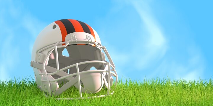 American football helmet with Cincinnati Bengals team colors. Green grass of football field. 3D render