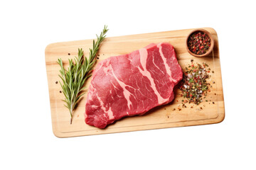 Fresh raw meat on a wooden cutting board with thyme, spices and garlic. Top view. Isolated on a clear background. PNG file.
