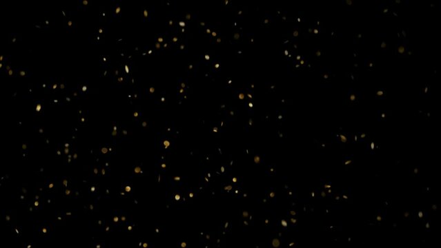 Gold particles celebration motion background. 4K glowing glamour gold dust Animation Video aplha channel