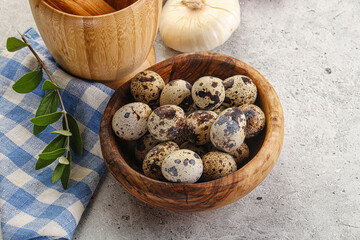 Raw quail eggs in the bowl