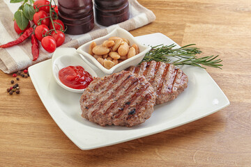Grilled beef burger cutlet with sauce