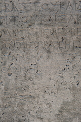 Ancient wall texture background with antique text