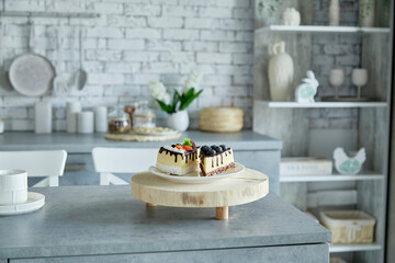 Plastic artificial cakes pieces in the studio cuisine. Food shooting concept