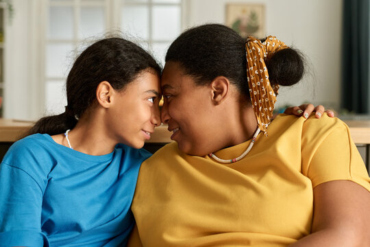 Daughter having a good relationship with mom, they enjoying time together at home