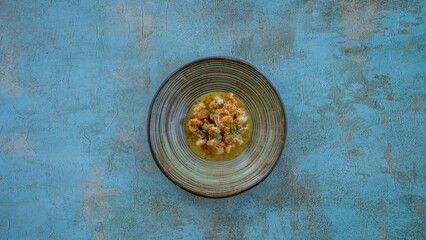 Traditional Turkish and Greek dinner meze table. Turkish Cuisine Cold Appetizers (appetizers with olive oil). Turkish appetizers in colorful plates. yogurt and various boiled herbs
