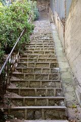 steep narrow stone stairs up the steep hillside