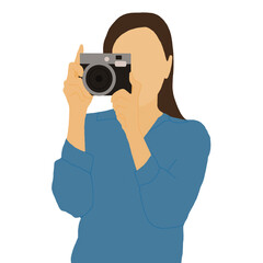 Young long hair woman holding a camera both hands taking photos. look at camera. front view. waist up.