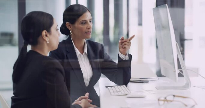 Business women, teamwork and planning on computer for human resources, software training or management in office. Professional manager or people reading on desktop for support, solution and questions